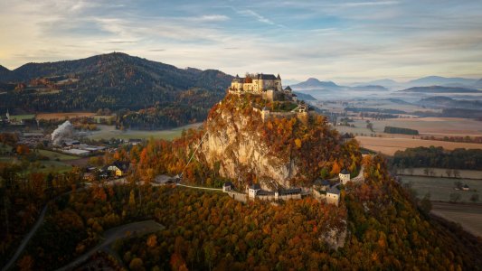View of Hochosterwitz Castle, one of Austria most impressive medieval castles dating back to the 9th century and one of the landmarks of Carinthia. Autumn morning in Alps, castle on the hill.